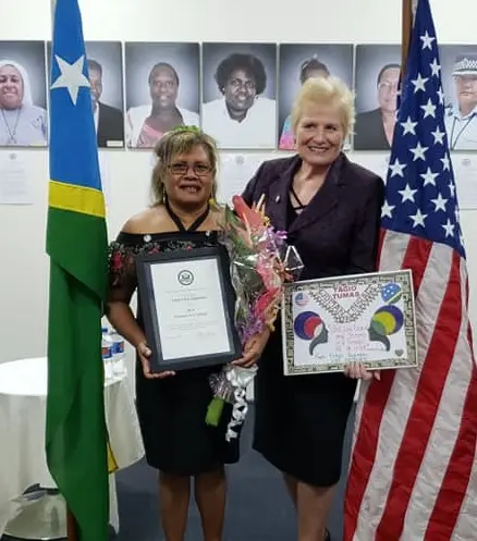 Ambassador Gray with Mrs Sigimanu at the award ceremony.