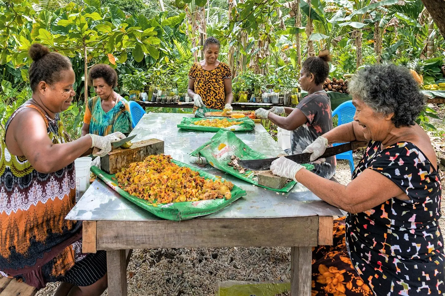 Women working on nutritional projects, part of an education programme to prevent NCDs by promoting a healthy diet.