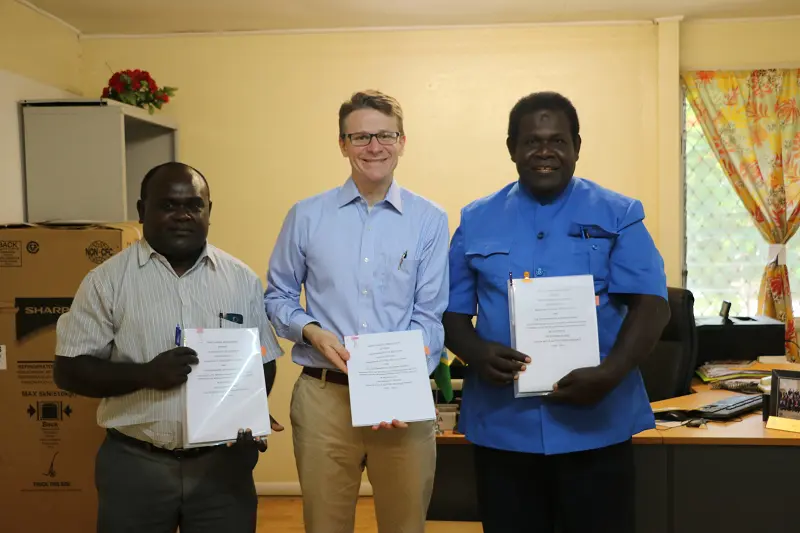 Australian High Commissioner Rod Brazier (middle) with Permanent Secretary MOFT, Harry Kuma (left)  and A/g Permanent Secretary MHMS, Arnold Moveni (right) after signing an agreement committing Australia to a new phase of support to the Solomon Islands health sector.