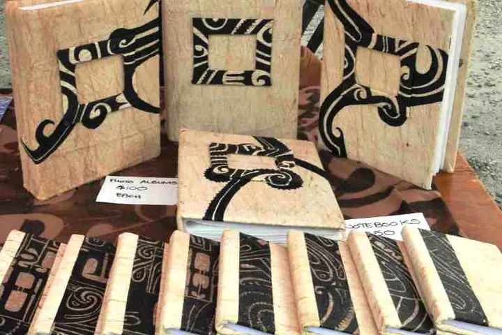 Alisa's book covers in a recent Sunday market in Honiara.
