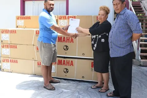 Fleet Solomons Company Managing Director Kensley Manu formally handover the $300,000 worth of Outboard Motor Engines to MP for Temotu Vatud Constituency Freda Rotutafi Rangirei and CDO Justine Tanema.